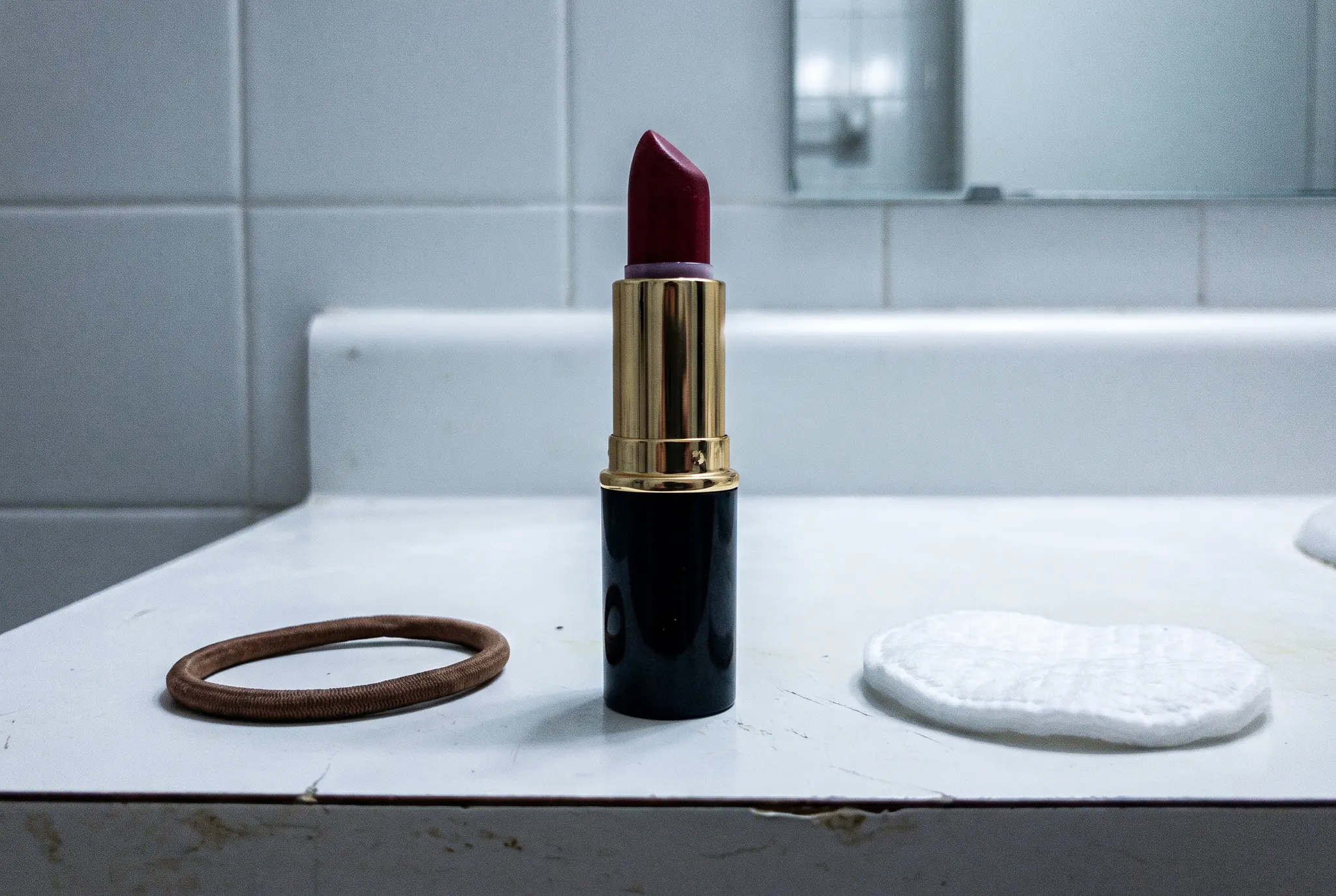 Lipstick on a bathroom counter, shot on a phone