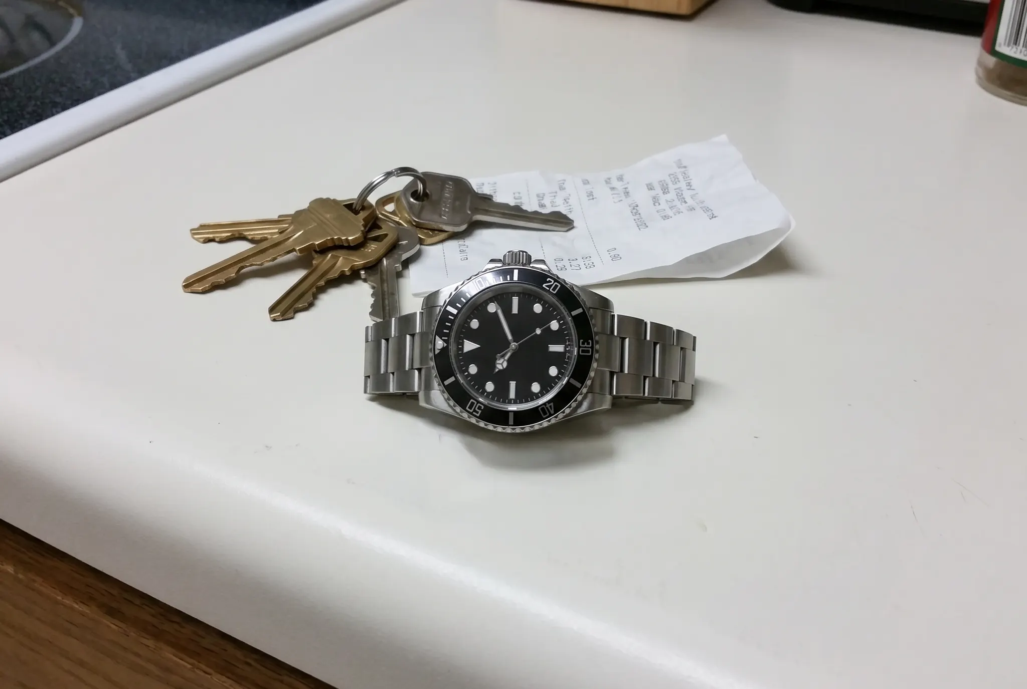 Wristwatch on a kitchen counter, shot on a phone